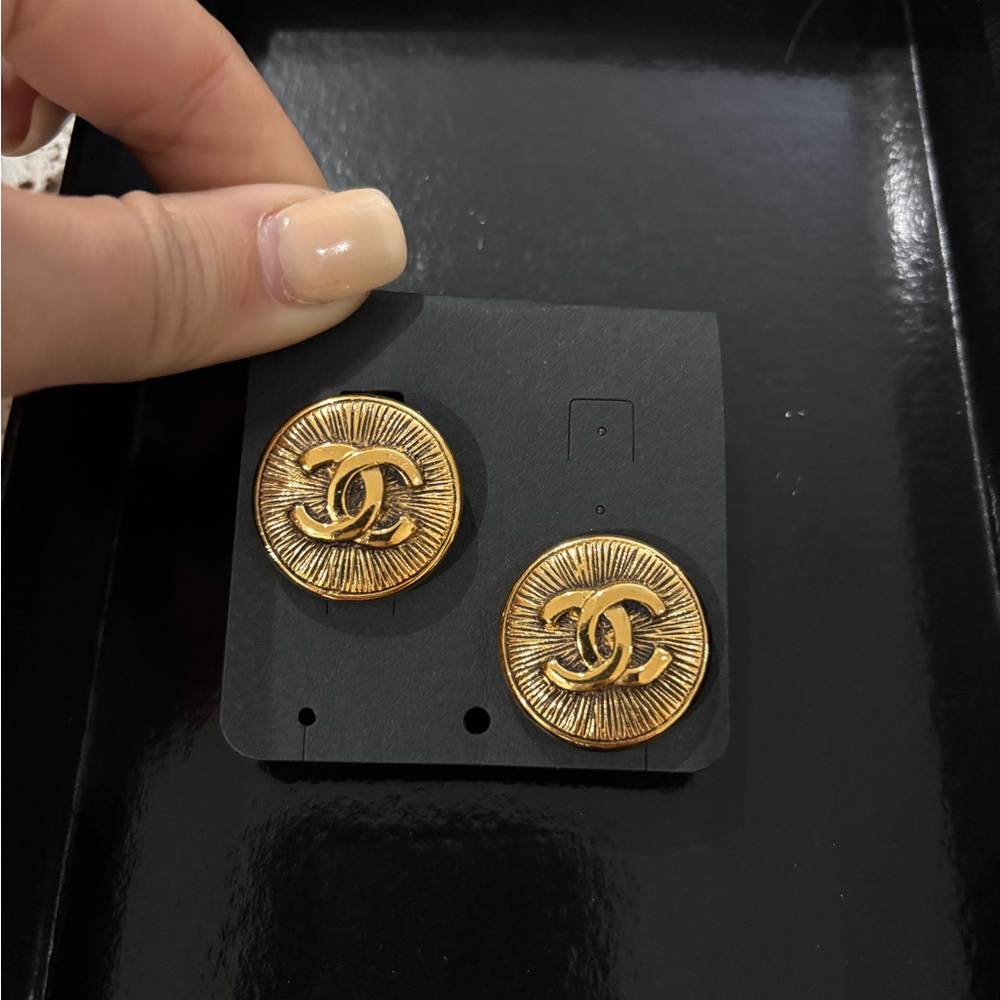 Authentic CHANEL gold plated vintage 90s round clip on CC earrings
